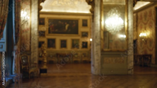Photos Blurred view of the opulent galleria doria pamphilj museum interior with ornate decorations, chandeliers, and framed artwork creating a historic and luxurious ambiance