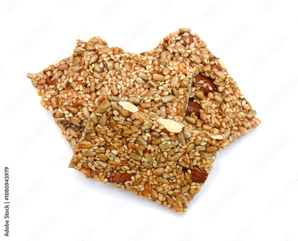 Honey bars with sunflower seeds on a white background Honey bars with sunflower seeds on a white background
