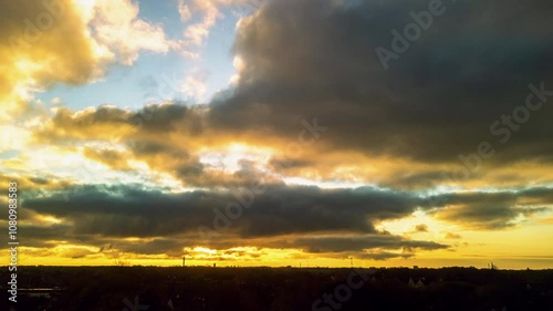 Timelapse of sunrise with dramatic clouds