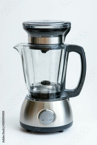 Stainless steel blender on white background.