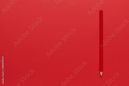 Minimalist Red Pencil on Red Background: Creative Simplicity Art