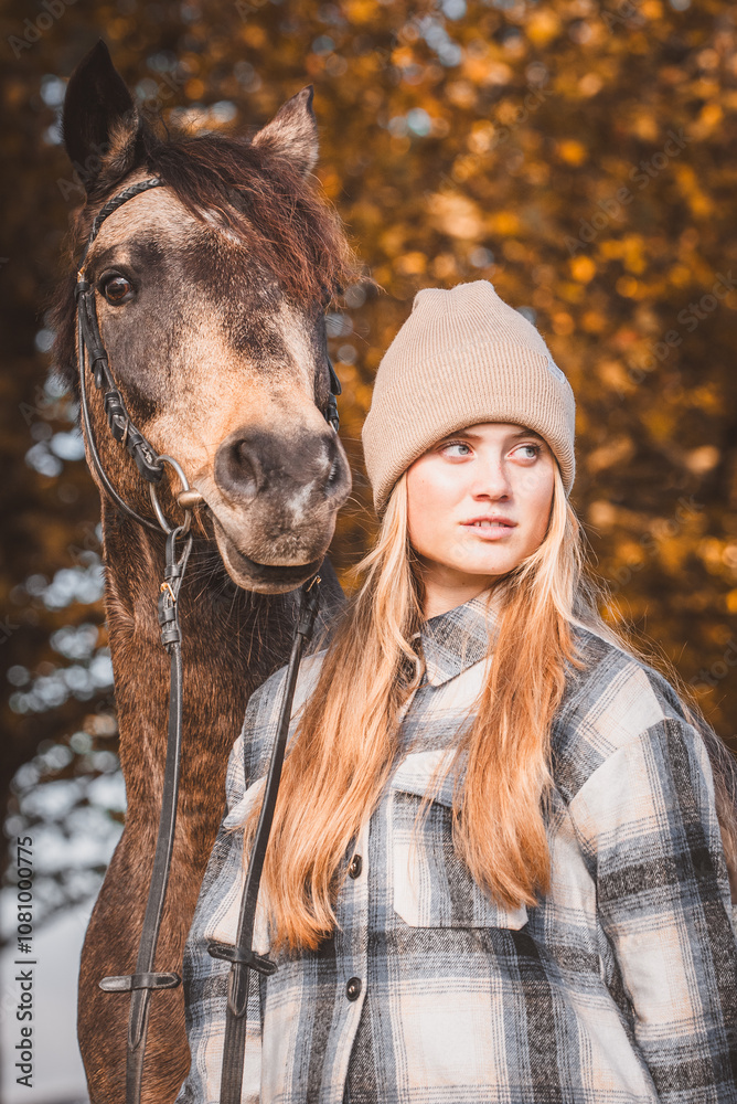 Fototapeta premium Mädchen mit Pferd