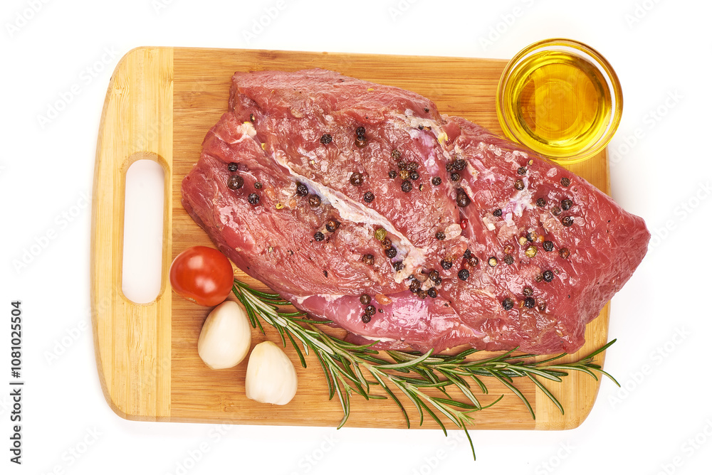 Raw pork piece of meat with spices, isolated on white background. Raw pork piece of meat with spices, isolated on white background.