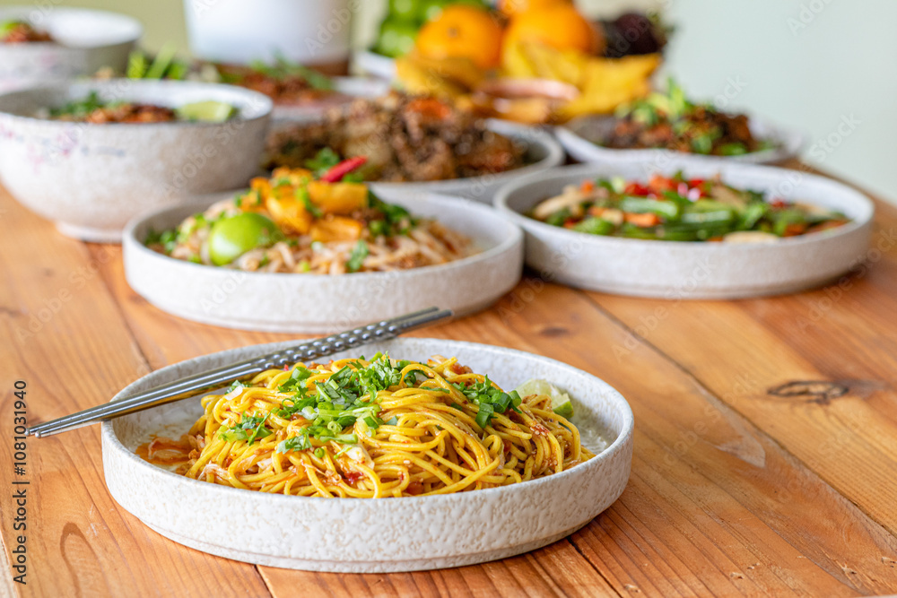 The Khao Soi Yuan Naan that is served on the plate is Khao Soi noodles mixed with minced pork spring onion coriander and chili lime and sesame spicy and sour. noodles chinese food tai yai food The Khao Soi Yuan Naan that is served on the plate is Khao Soi noodles mixed with minced pork spring onion coriander and chili lime and sesame spicy and sour. noodles chinese food tai yai food