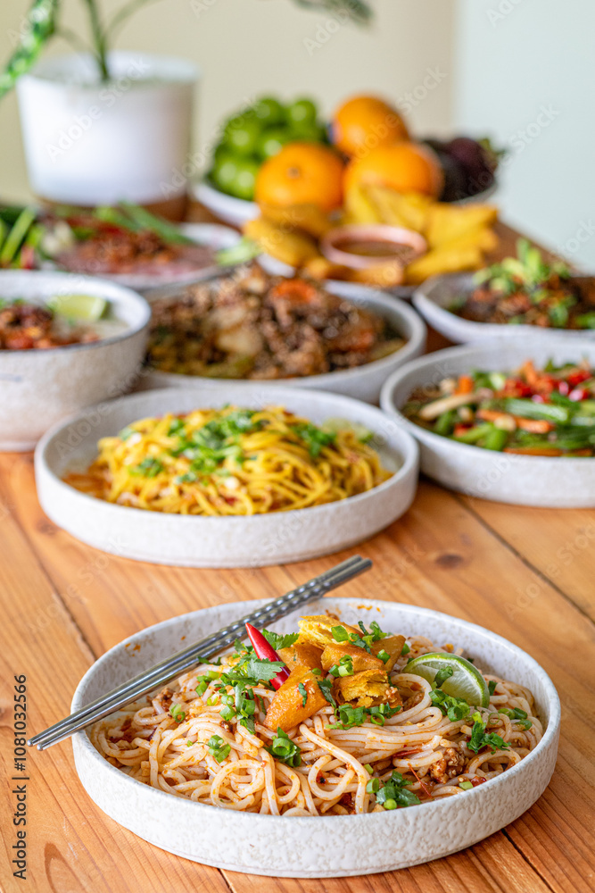 The Khao Soi Yuan Naan that is served on the plate is Khao Soi noodles mixed with minced pork spring onion coriander and chili lime and sesame spicy and sour. noodles chinese food tai yai food The Khao Soi Yuan Naan that is served on the plate is Khao Soi noodles mixed with minced pork spring onion coriander and chili lime and sesame spicy and sour. noodles chinese food tai yai food