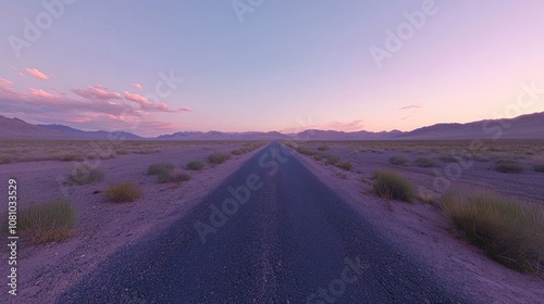 Peaceful Sunrise over Desert Road with Mountain View and Pastel Sky