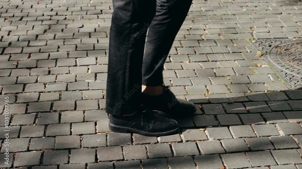 Man businessman boss walking near his office center in a dark business suit, Experienced CEO entrepreneur in modern office district Man businessman boss walking near his office center in a dark business suit, Experienced CEO entrepreneur in modern office district