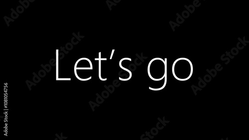 A dynamic Let's Go message illuminated on a black background, encouraging energy and action.