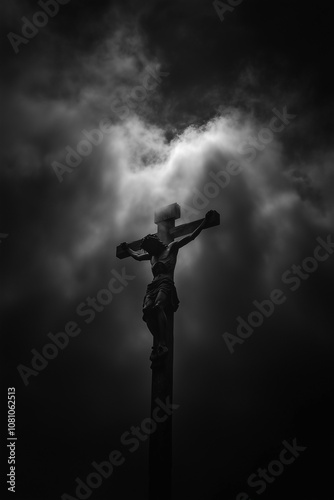 A Silhouette of Jesus on the Cross Against a Darkened Sky