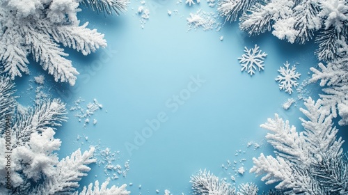 Pastel blue christmas background with snowflake border for text