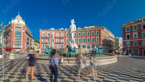 Fountain The Sun Fountain du Soleil with a marble statue of Apollo timelapse hyperlapse. France, Nice photo