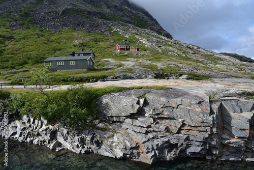 Landscape with montains, rocks, way and huts. Andalsness, Trollstiegen. Norway photo