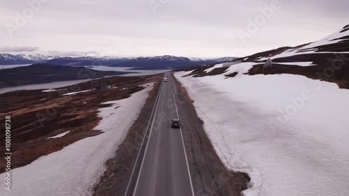 road in the mountains of norway capured with snow