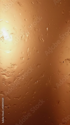 A warm, copper-toned surface with subtle texture variations. photo