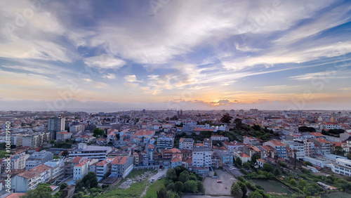 Rooftops of Porto's old town on a warm spring day timelapse during sunset, Porto, Portugal