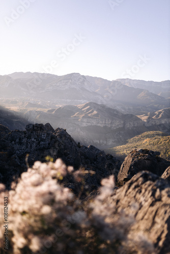 The glowing sun rising over mountains range