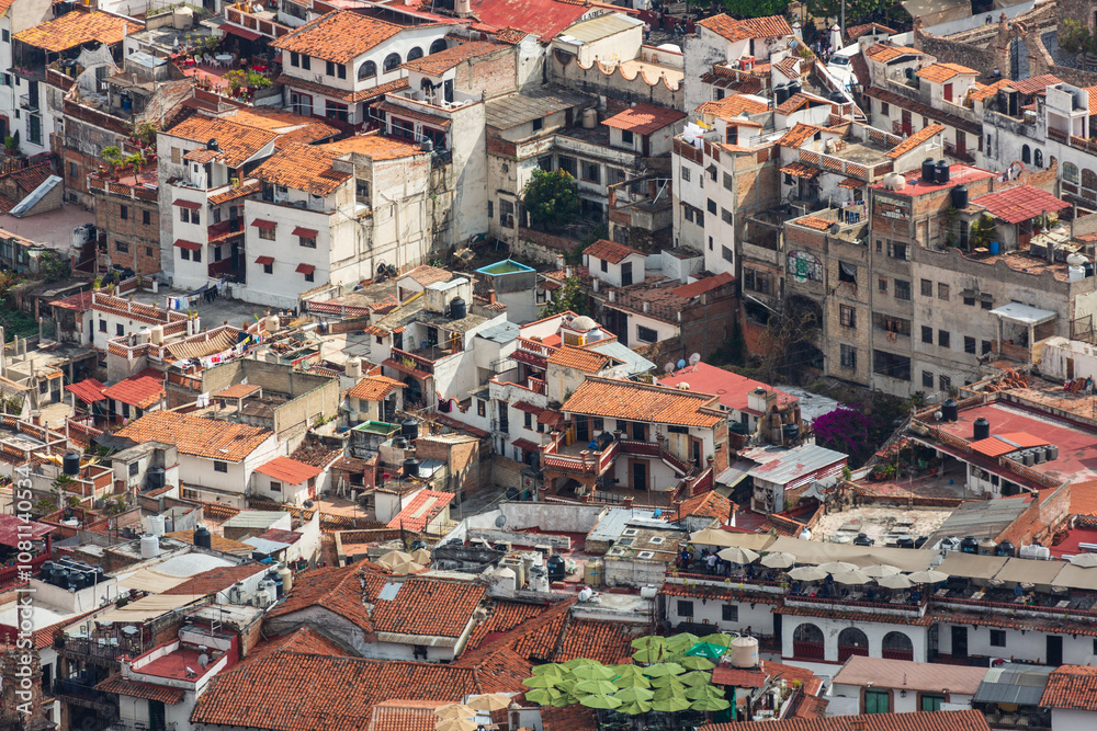 Aerial view over Pueblo Magico of Taxco, which rose to prominence in the 18th century, is one of Mexico's most scenic towns with Santa Prisca church. Taxco, Guerrero, Mexico Aerial view over Pueblo Magico of Taxco, which rose to prominence in the 18th century, is one of Mexico's most scenic towns with Santa Prisca church. Taxco, Guerrero, Mexico