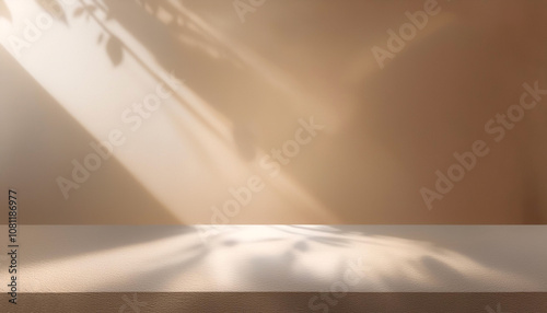 Empty biege background for product presentation with beautiful lights and shadows