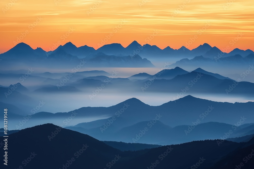 Fototapeta premium The mountains are covered in a thick layer of fog, creating a serene