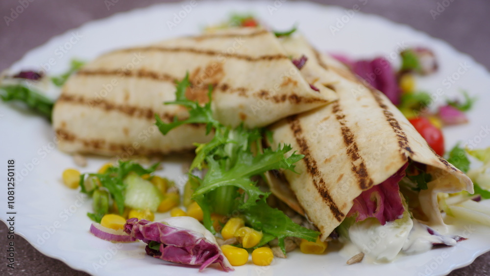 Tortilla wrap with vegetables and garlic sauce Tortilla wrap with vegetables and garlic sauce