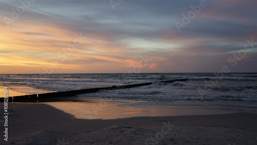 Sunset on the beach by the sea