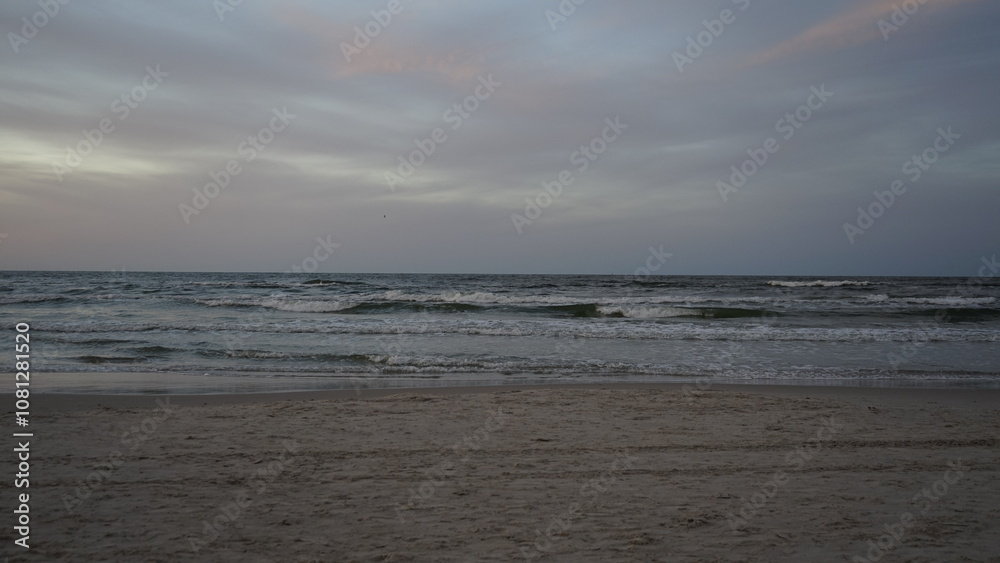 Sunset on the beach by the sea Sunset on the beach by the sea