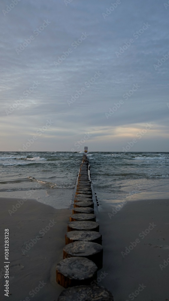 Fototapeta premium Sunset on the beach by the sea