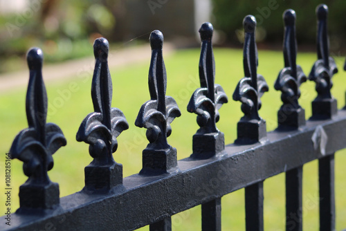 ornate black iron fence posts