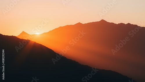 Majestic Mountain Range Sunrise Silhouette - Warm Glow Landscape