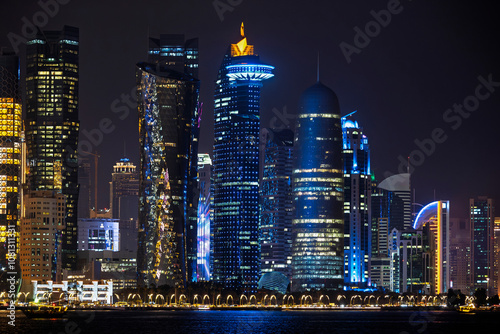 Evening view of illuminated skyscrapers in Doha, Qatar