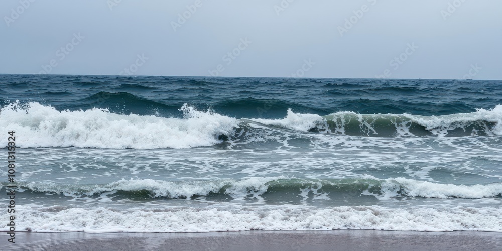 Dynamic and powerful sea water wave crashing against the shore under a cloudy sky, storm, dramatic, aquatic Dynamic and powerful sea water wave crashing against the shore under a cloudy sky, storm, dramatic, aquatic