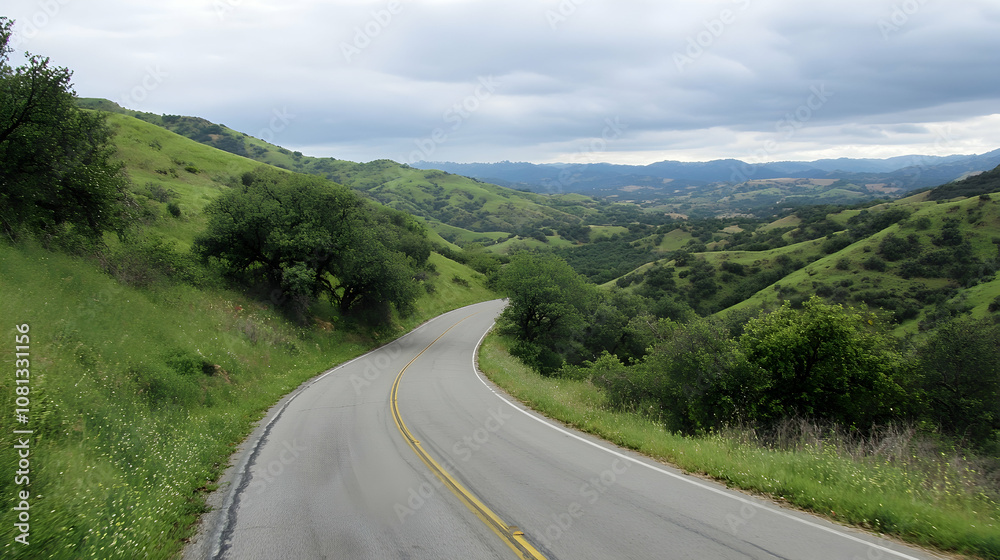 Curving hillside road with views of rolling green hills, scenic countryside drive. high quality Curving hillside road with views of rolling green hills, scenic countryside drive. high quality
