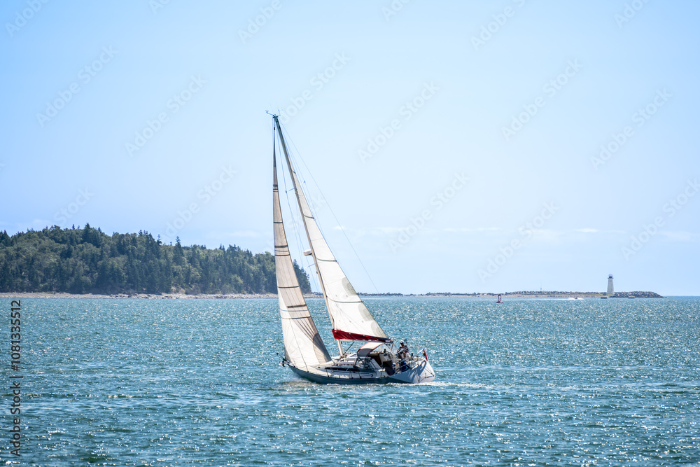 Obraz premium Sailing yacht racing on blue sea