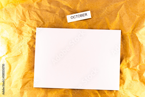 blank sheet of note with autumn leaves page list of plans for meetings and events for the month october