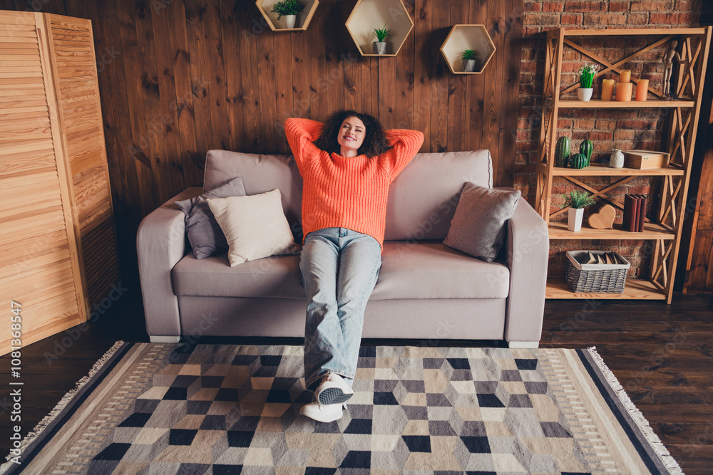 Obraz premium Full size photo of pretty young woman sit sleep couch loft interior apartment indoors