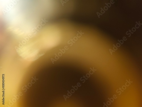Bokeh background effect The atmosphere is very luxurious and precious. Glittering yellow gold diamonds fell. Contrasts beautifully with the black background.