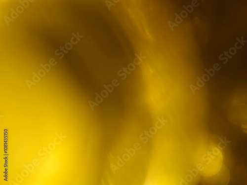 Bokeh background effect The atmosphere is very luxurious and precious. Glittering yellow gold diamonds fell. Contrasts beautifully with the black background.