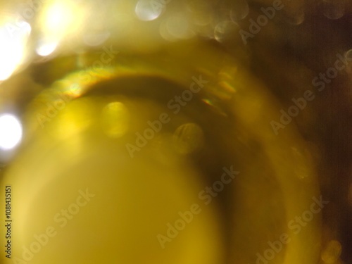 Bokeh background effect The atmosphere is very luxurious and precious. Glittering yellow gold diamonds fell. Contrasts beautifully with the black background.