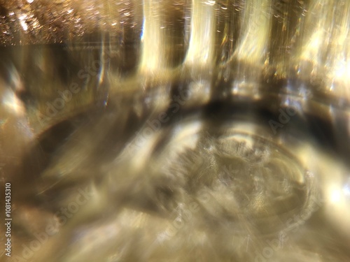 Bokeh background effect The atmosphere is very luxurious and precious. Glittering yellow gold diamonds fell. Contrasts beautifully with the black background.