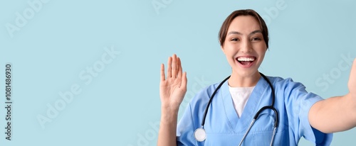 Beautiful female doctor wav...
