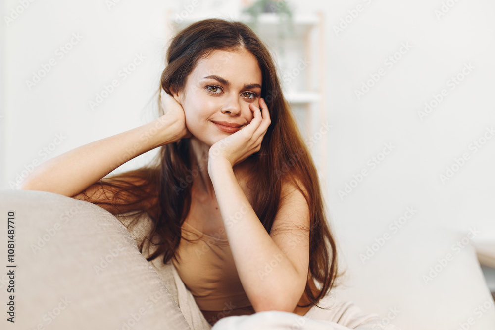 Cozy Sofa, Happy Smiles: Confident Woman Relaxing at Home