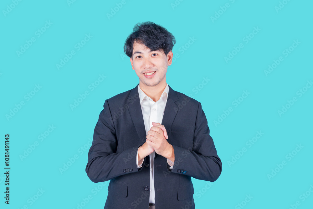 Smiling handsome young man southeast asian man on blue background Smiling handsome young man southeast asian man on blue background