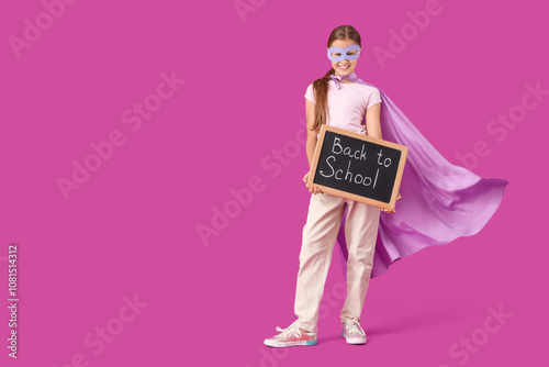 Teenage girl dressed as sup...