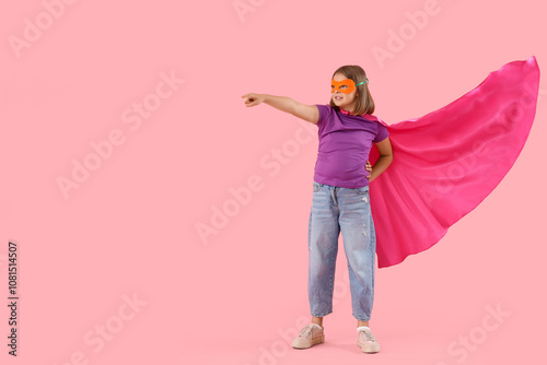 Teenage girl dressed as sup...