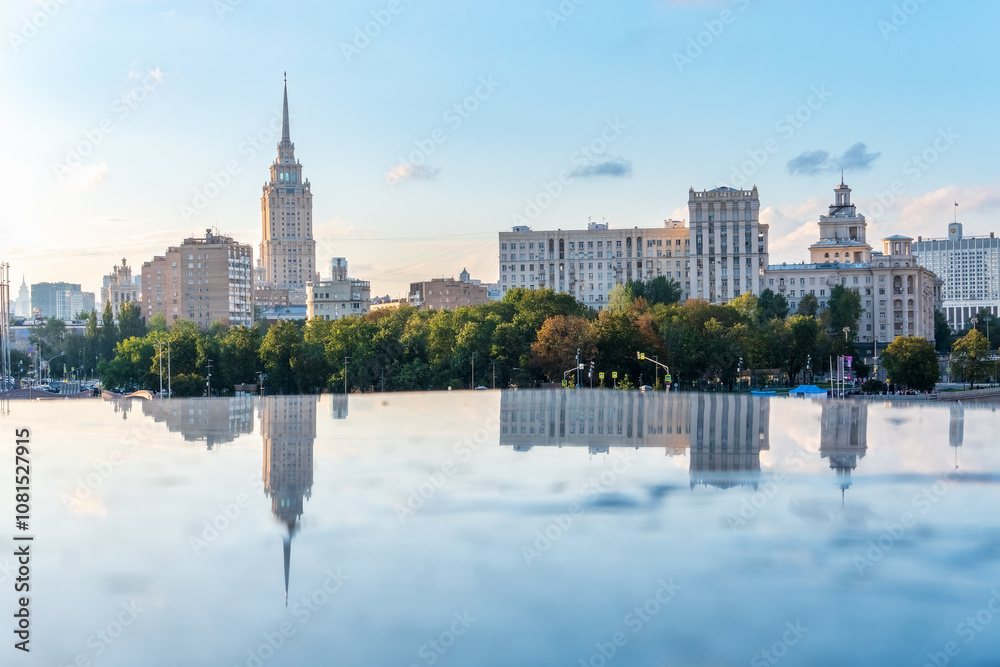 Obraz premium View of Berezhkovskaya Embankment in Moscow with reflection on a mirror stone surface
