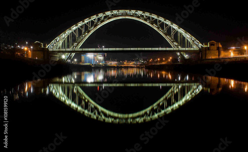 Bridge illuminated at night generated by AI