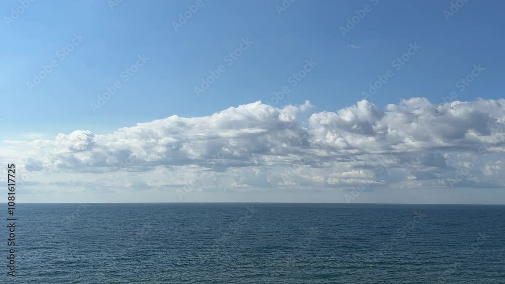 Blue sea calm water and beautiful clouds in sky. Blue sea calm water and beautiful clouds in sky.