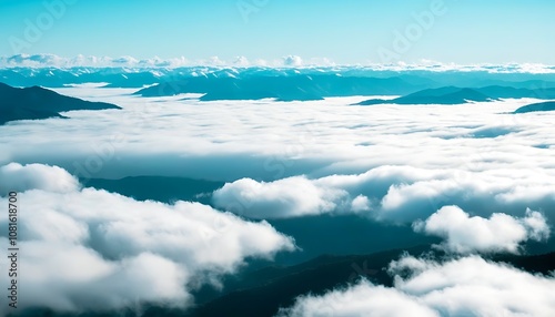 majestic mountains under misty clouds, picturesque views, serene and tranquil.