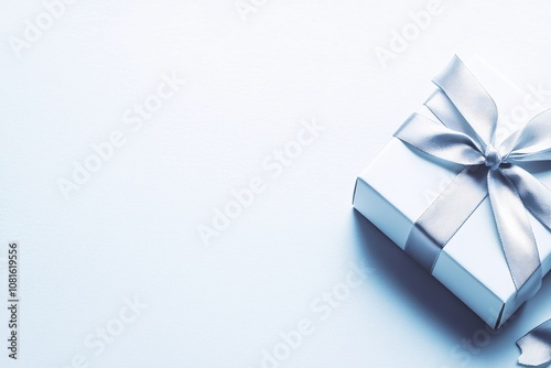 Elegant White Gift Box with Silver Ribbon photo