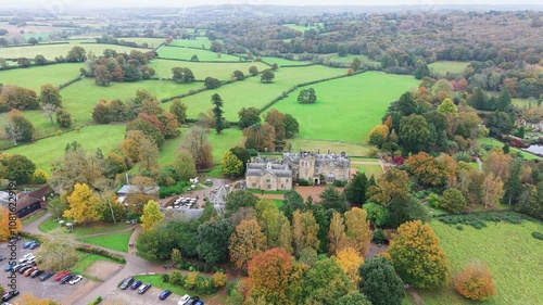 Scotney castle mansion gardens aerial view establishing rolling autumn Kent countryside grounds photo